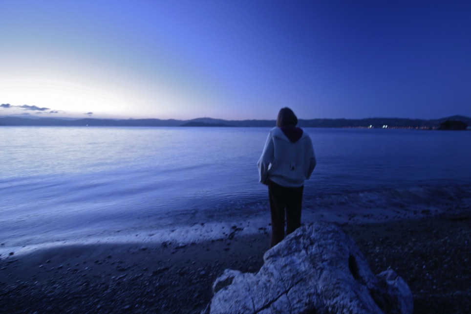 Woman on beach evening